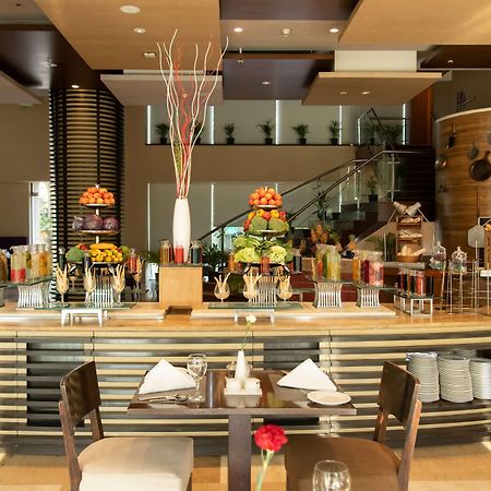 浦那辛杰瓦迪华美达广场温德姆酒店 Dāpuri 外观 照片